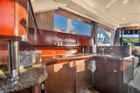 the interior of a luxury yacht with a television