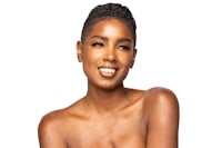 a black woman in a bikini posing for a photo