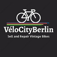 the logo for velocity berlin sell and repair vintage bikes