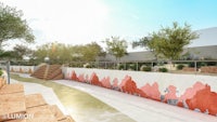 an artist's rendering of a walkway with a colorful mural