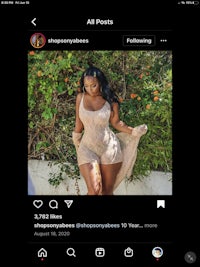a woman is posing on an instagram screen