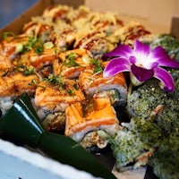 a box of sushi and other food in a box