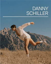 danny schiller - a man in white shorts in the desert