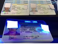 a photo of a id card with a blue light on it