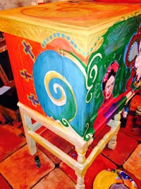 a colorful painted piece of furniture