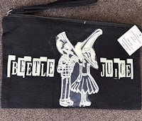 a black zipper pouch with the words bette juice on it