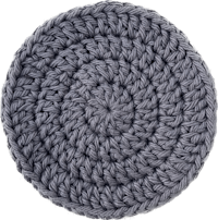 a grey crocheted coaster on a black background