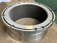 a stainless steel flange on a table