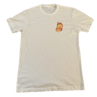 a white t - shirt with an image of a fire