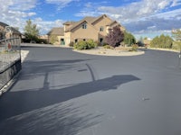 a driveway that has been painted with a black coating