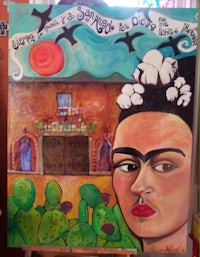 a painting of frida kahlo with cactus in the background