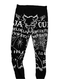 a pair of black leggings with an image of a board and spiders