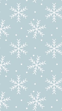 a white snowflake pattern on a blue background