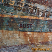 a rusty boat with the words dram gang uk on it