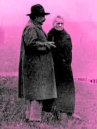 a photo of a man and woman standing in a field