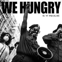 a black and white photo of people holding signs with the words we hungry