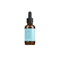 a bottle of hyaluronic acid serum on a white background