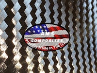 a metal plate with an american flag on it
