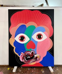 a painting of a clown in a studio