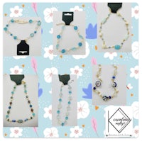 a collection of necklaces and bracelets on a blue background