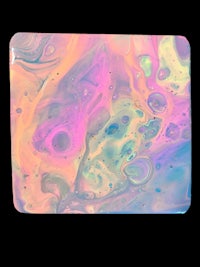 a colorful mouse pad on a black background