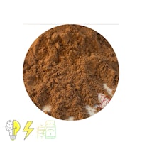 cocoa powder in a circle on a white background