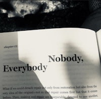 an open book with the words'nobody'written on it