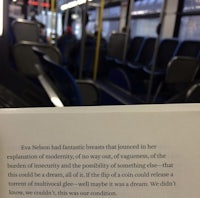 an open book on a bus