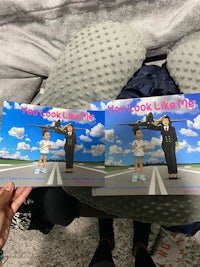 a pair of books with a picture of a plane on them