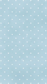 a light blue background with white polka dots