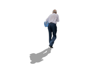 a man is walking on a black background