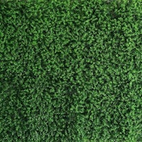 a close up of a green artificial grass mat