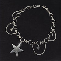 a silver choker with a star and stars on it