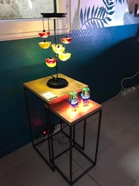 a table with a lamp on top of it