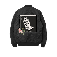a black bomber jacket with an image of a hand with roses on it