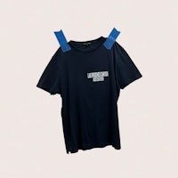 a t - shirt with blue tape on it