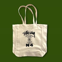a tote bag with the word stugy on it