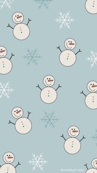 a snowman pattern with snowflakes on a blue background