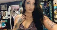 a woman with tattoos in a tattoo shop