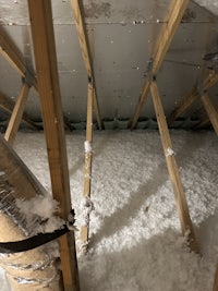 the ceiling of a house with a lot of insulation