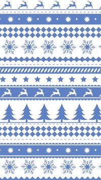 a blue and white christmas pattern with snowflakes and reindeer