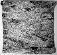 a black and white drawing on a pillow