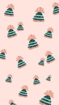 a pattern of knitted hats on a pink background