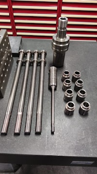 a set of metal tools on a table