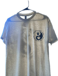 a grey t - shirt with a blue logo on it