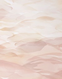 a watercolor background with a pink and beige color