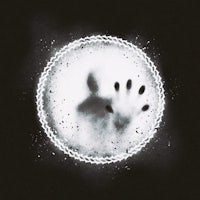 a black and white image of a hand in a circle