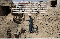 a boy standing next to a pile of rubble with a quote