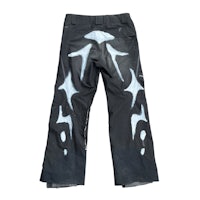 a pair of snowboard pants with a black and white design