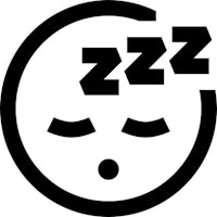 a black and white icon of a sleeping face